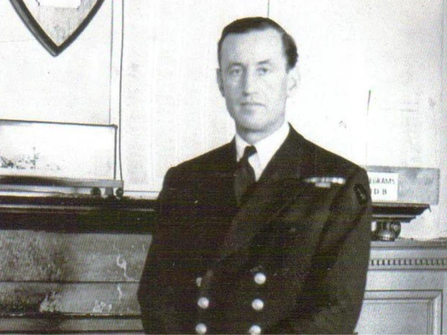 Commander Ian Fleming in Room 39 at the Admiralty in London